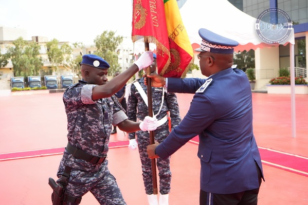 Remise du drapeau national aux contingents SENFPU 3-4 et 2-6 en partance pour la MINUSCA