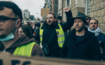 France: à Paris, un cortège imposé en bordure de la capitale et des heurts en fin de manifestation